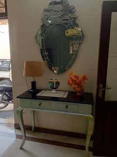 console table with stylish mirror