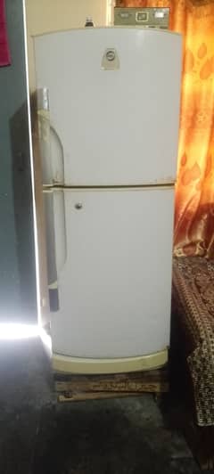 Used refrigerator in home in clear and a good working and good conditi