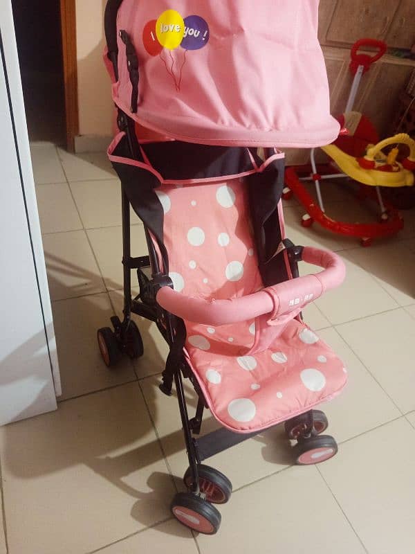 Baby Stroller (Almost New) + Baby Booster Dining Chair + 1