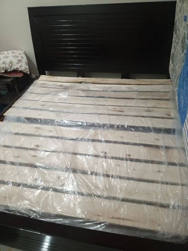 wooden  double bed 0