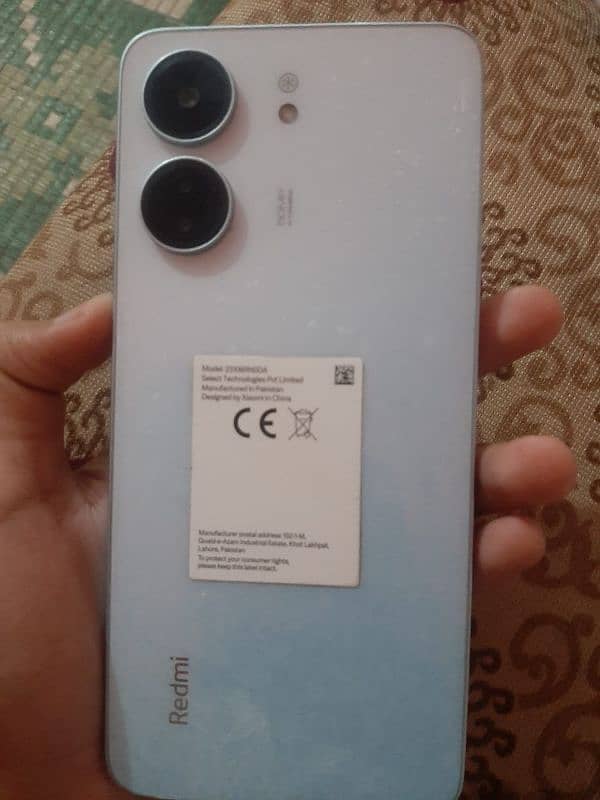 REDMI 13C GLACIER WHITE COLOUR 10 BY 10 CONDITION INWARRANTY 6GB 128gb 2