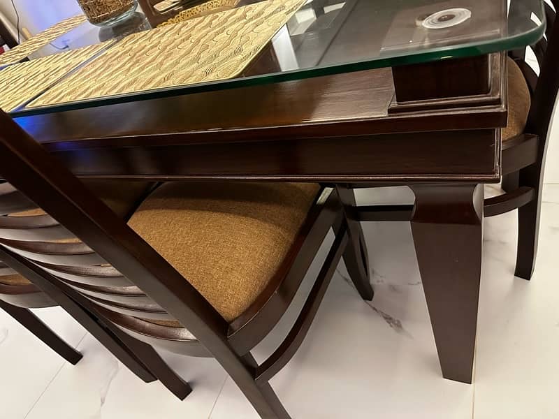 Wooden double top dining table with glass 1