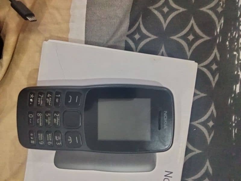 Nokia 106 brand new condition slidely used 7