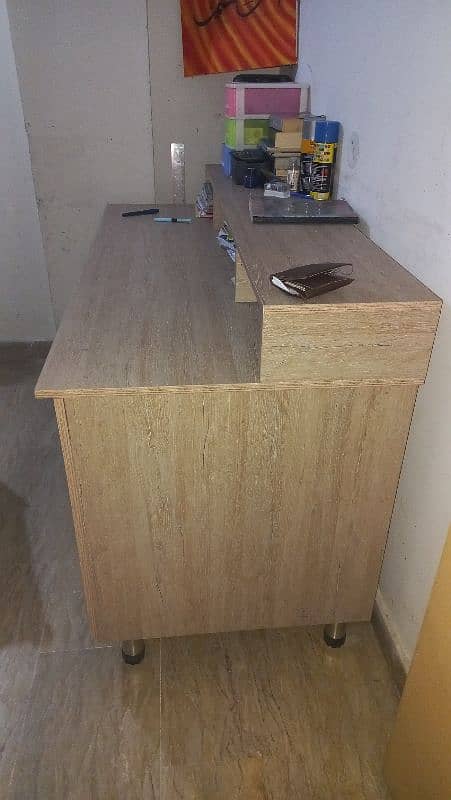 study table with drawer and side cabinets. 1