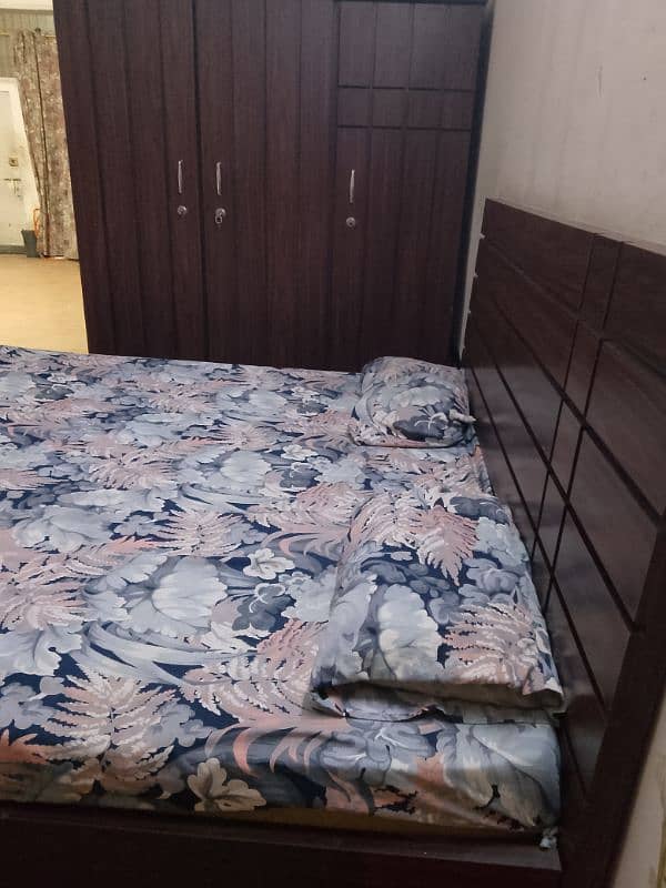 wooden Bed and three doors wardrobe without mattress 1