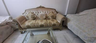 seven seater sofa along with centre table