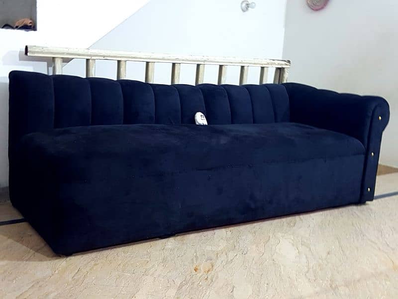 3-4 seater dewan styled Black Sofa 1