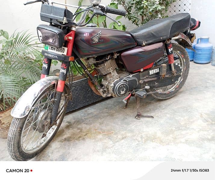 Honda 125 model 2014 A red colour good condition documents complete 1