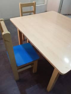 Kids study table and chairs