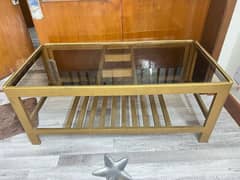 one wooden center and two side tables for sale