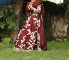 Bridal dress in maroon colour