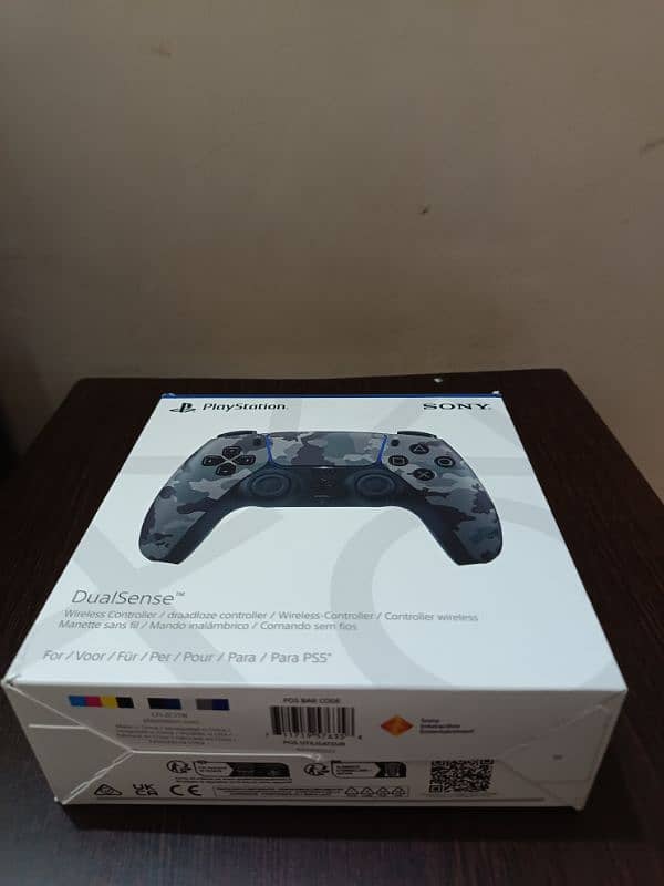 PS5 Region 1 USA model for sale with black face plates New camo contrl 12