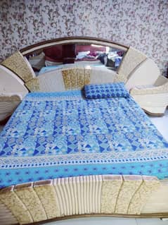 Bed with mattress side table. . dressing table mirror