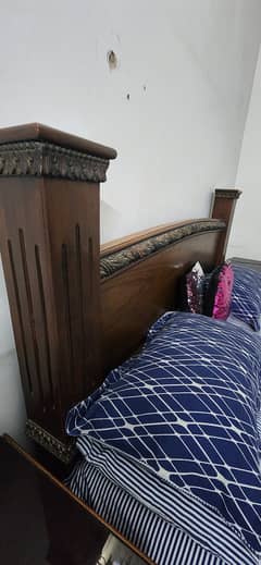 Wooden bed and side tables