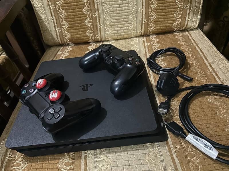 ps4 slim 1tb with 2 orignal controllers brand new condition 0