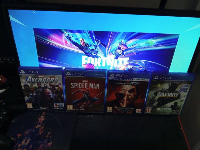 PS4 PRO PREMIUM CONDITION WITH 6 GAMES AND 2 CONTROLLERS 11