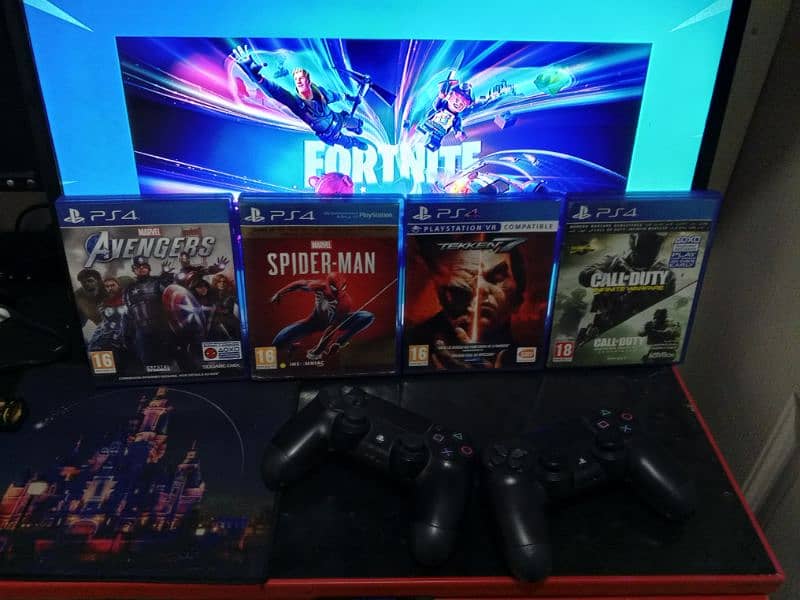 PS4 PRO PREMIUM CONDITION WITH 6 GAMES AND 2 CONTROLLERS 16