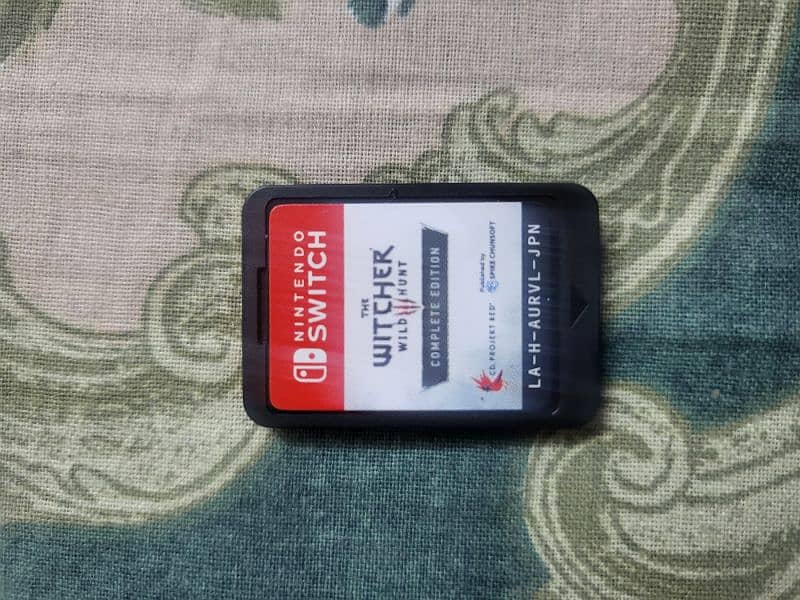 nintendo switch oled with 10 games 1