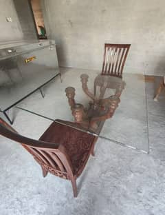 Six chairs dining table with top glass