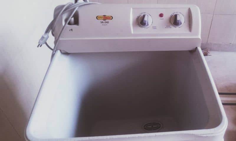 we are selling good condition of washing machine 2