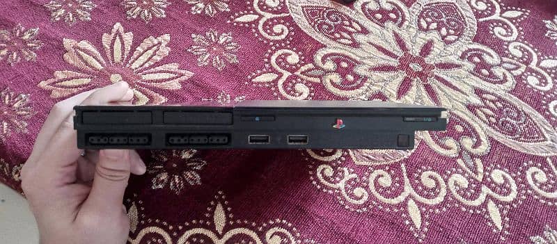 PlayStation 2 slim 0