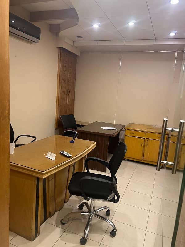 On main sharah e faisal corporate building 1395 sq ft office with 2 washrooms and 1 parking 1