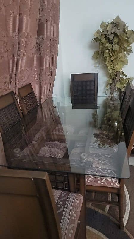 6 chairs and dining table with glass top 1