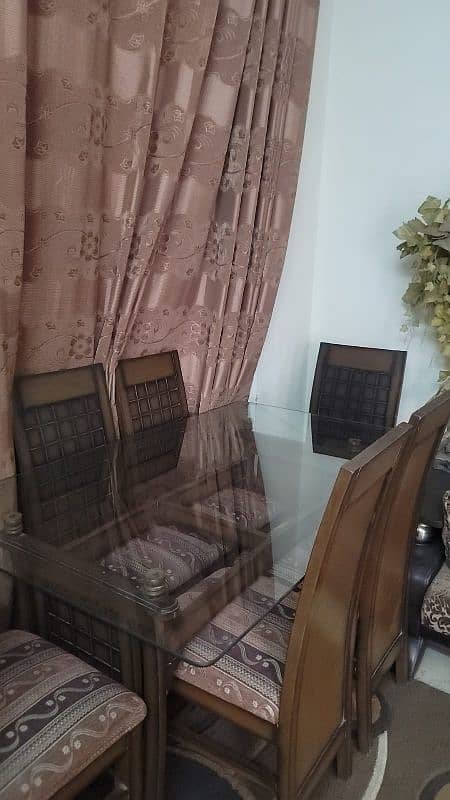 6 chairs and dining table with glass top 2