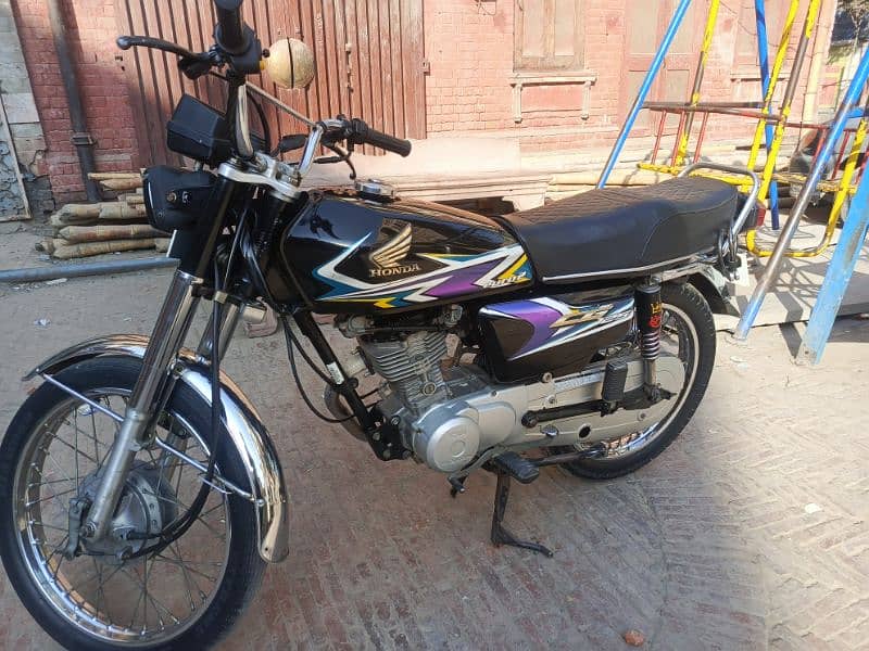 Honda 125 good condition total genioun 0