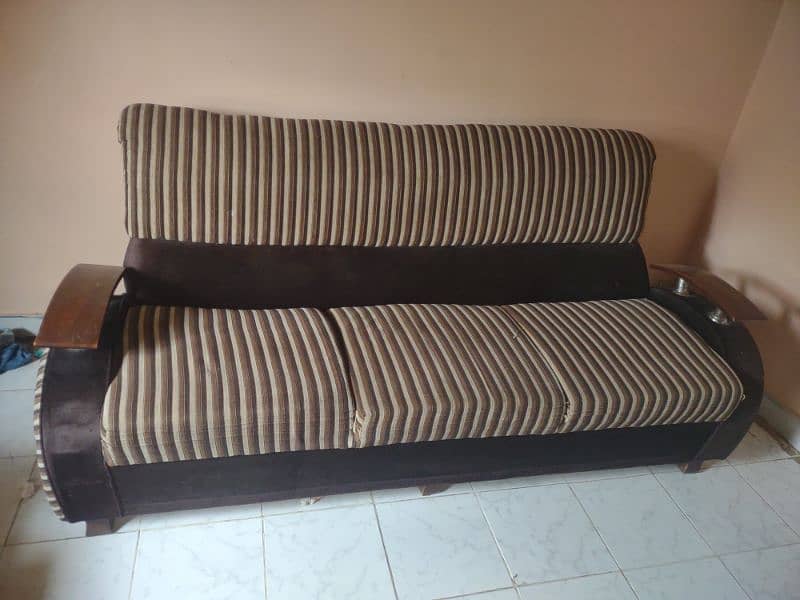 5 seater sofa set with table and cover  used only 4 years 1