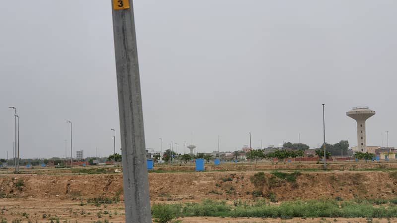 Investment Alert! 5 Marla Plot | 100 Ft Road | Bahria Town Lahore 11