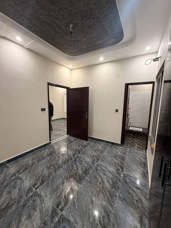 "Modern 3 Marla Double-Story House, Perfectly Located Near Gajjumatah Metro in Shahid Town!" 5