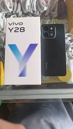 Vivo y 28 8gb 128gb ma complete box ka sat Condition  11 month warry