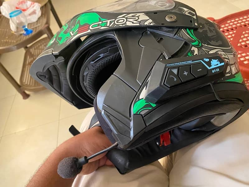 heavy helmet with bluetooth attached 2