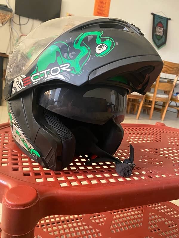 heavy helmet with bluetooth attached 4