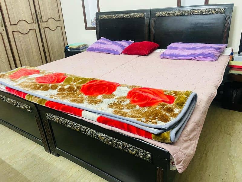 Two single beds with mattress, side table, mirror  wooden carving 0