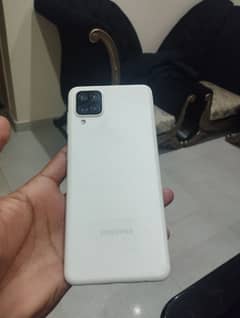 Samsung A12 with charger and dibba