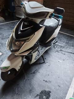 electric scooty Yj future green for sale 1.5 year used good condition