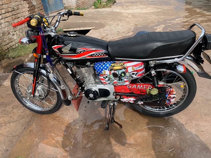 Honda 125 model 2022 mardan number ha 100% ok no accident no makanik 2