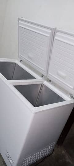 double door wala  freezer 85000. abhi bilkul new hai