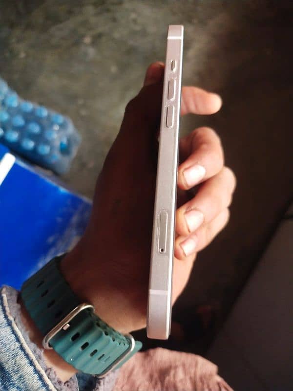 128 GB Waterpck I phone 13 Mini 10/10 condition 4