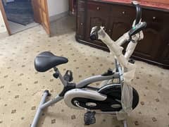 gym cycle , exercise bike