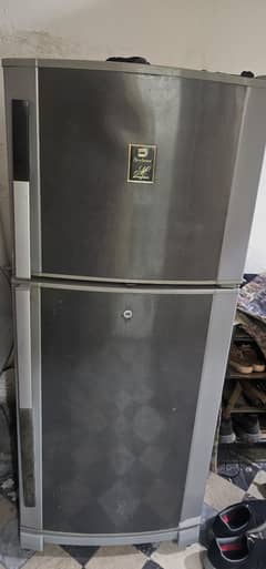 Dawlance Refrigerator medium size in excellent working and physical c