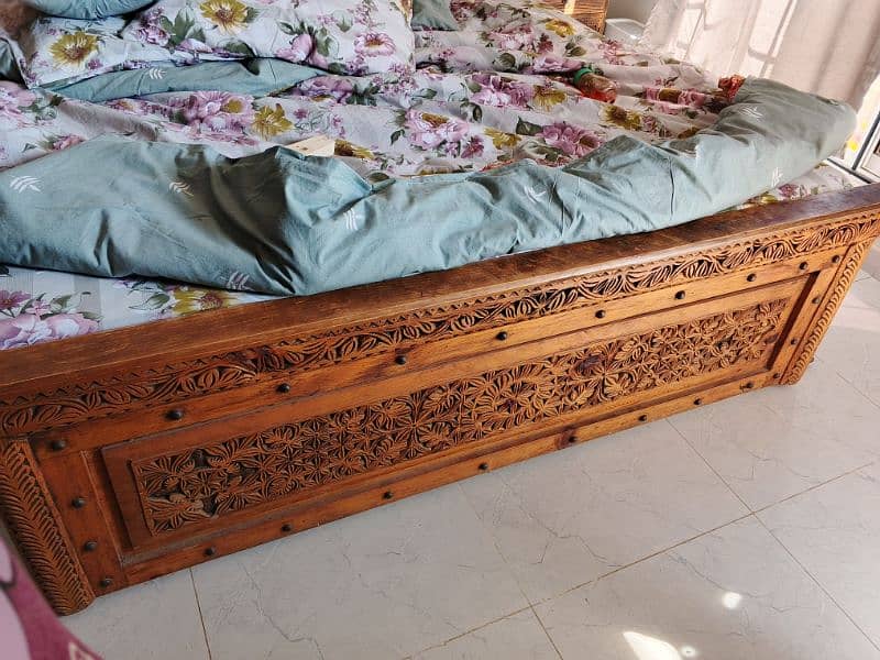 Swati wooden carved metal stidded king sized bed with 2 side tables 4