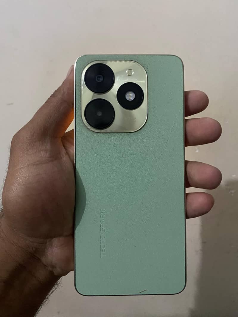 Tecno Spark 20c. BoxOpen. 9MonthsCompanyWarranty. Mint Color. Leather Back 0