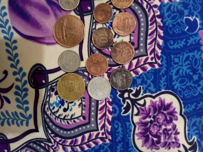 Foreign coins and 25 paisa of pakistan 1