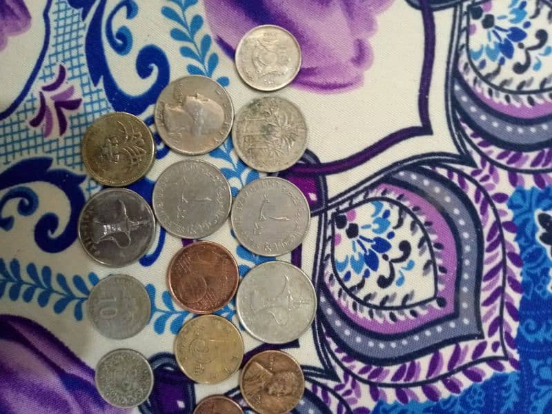 Foreign coins and 25 paisa of pakistan 2