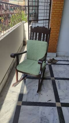 Rocking chair for outside sitting.