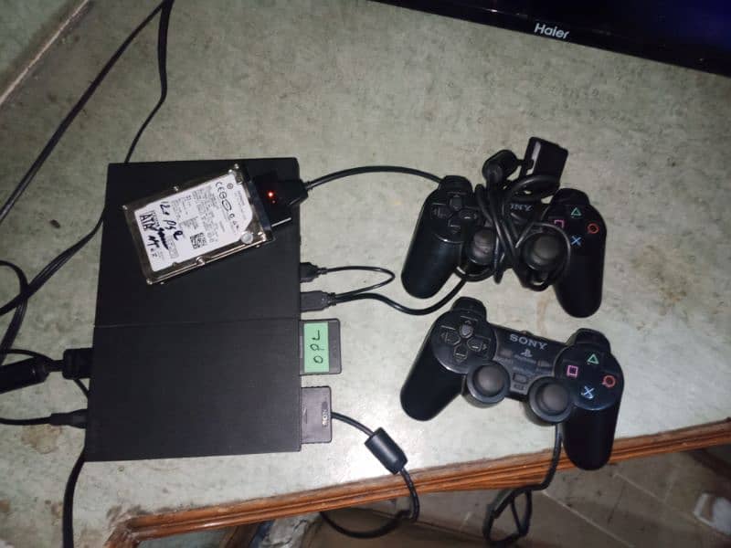 Ps2 with 2 controllers and hard drive 1