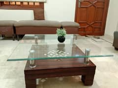 sofa, puffy set and center table